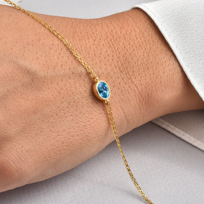 Oval Blue Topaz Bezel Bracelet in 14K Solid Gold, December Birthstone Queen Jewelry Bracelet